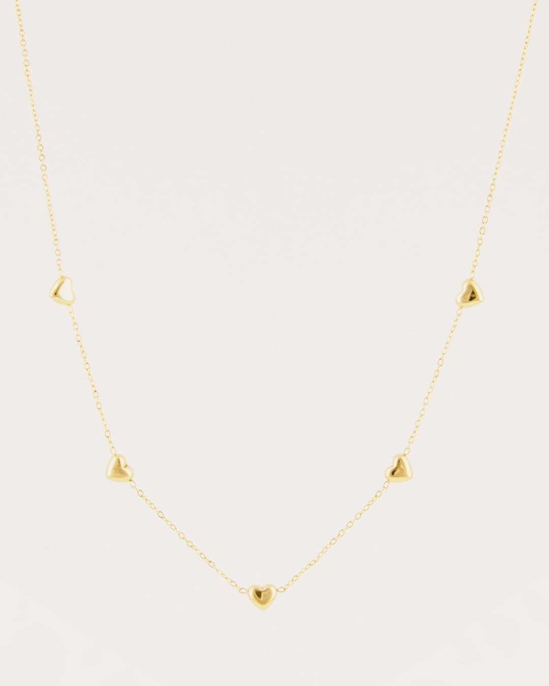 Collar Acero Cinco Corazones Dorado