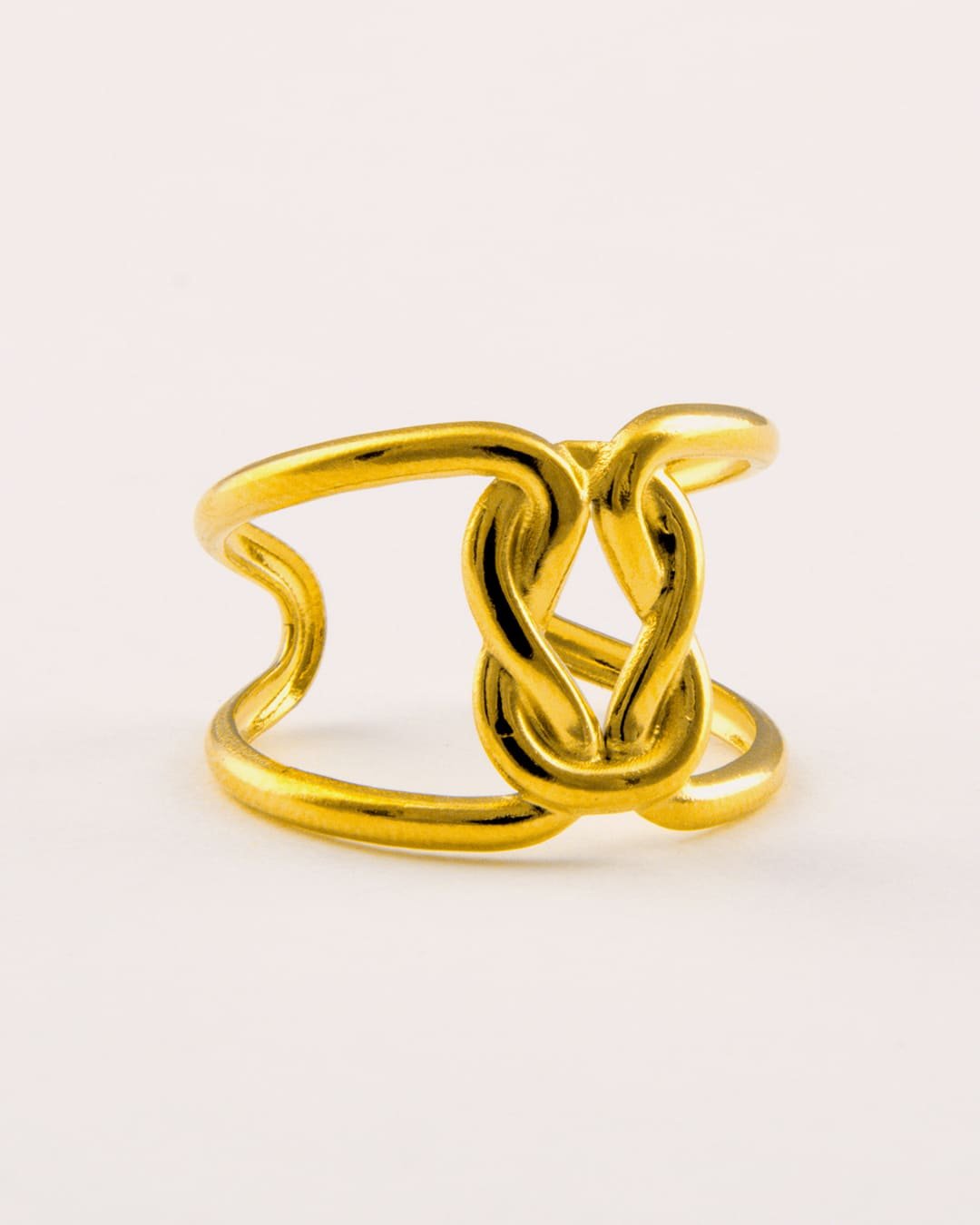 Anillo Acero Nudo Dorado
