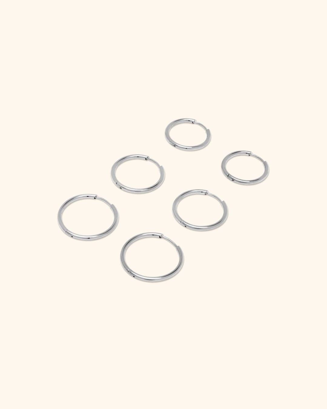 Par De Pendientes De Aro De Acero Inoxidable Plateado Y Con Baño De Oro